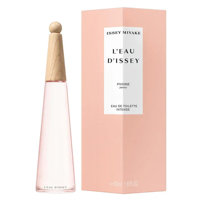 A 50ml tall conical glass bottle of Issey Miyake L'Eau d'Issey Pivoine with a light-colored wooden cap, standing next to its tall, minimalist pastel pink box featuring a white vertical label.